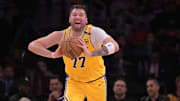 Feb 10, 2025; Los Angeles, California, USA; Los Angeles Lakers guard Luka Doncic (77) looks to make a long pass down court in the first half against the Utah Jazz at Crypto.com Arena. 