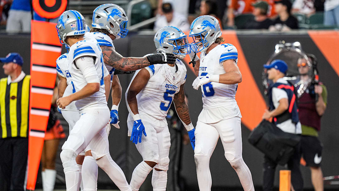 Detroit Lions wide receiver Isaac Teslaa (18) celebrates a touchdown against Cincinnati Bengals with running back David Montgomery (5) during the second half at Paycor Stadium in Cincinnati on Sunday, Oct. 5, 2025. Detroit Lions wide receiver Isaac Teslaa (18) celebrates a touchdown against Cincinnati Bengals with running back David Montgomery (5) during the second half at Paycor Stadium in Cincinnati on Sunday, Oct. 5, 2025.