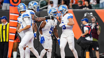 Detroit Lions wide receiver Isaac Teslaa (18) celebrates a touchdown against Cincinnati Bengals with running back David Montgomery (5) during the second half at Paycor Stadium in Cincinnati on Sunday, Oct. 5, 2025.