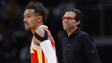 Trae Young # 11 and Head Coach Quin Snyder of the Atlanta Hawks