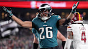 Jan 26, 2025; Philadelphia, PA, USA; Philadelphia Eagles running back Saquon Barkley (26) celebrates after a touchdown against the Washington Commanders during the second half in the NFC Championship game at Lincoln Financial Field. Mandatory Credit: Bill Streicher-Imagn Images