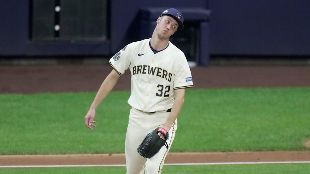 Oct 11, 2025; Milwaukee, Wisconsin, USA; Milwaukee Brewers pitcher Jacob Misiorowski (32) reacts after throwing a walk during game five of the NLDS round for the 2025 MLB playoffs against the Chicago Cubs at American Family Field. Mandatory Credit: Mark Hoffman-USA TODAY Network via Imagn Images