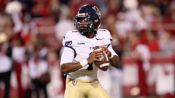 Nov 18, 2023; Fayetteville, Arkansas, USA; FIU Panthers quarterback Keyone Jenkins (1) looks to pass in the second quarter against the Arkansas Razorbacks at Donald W. Reynolds Razorback Stadium. Mandatory Credit: Nelson Chenault-Imagn Images Nov 18, 2023; Fayetteville, Arkansas, USA; FIU Panthers quarterback Keyone Jenkins (1) looks to pass in the second quarter against the Arkansas Razorbacks at Donald W. Reynolds Razorback Stadium. Mandatory Credit: Nelson Chenault-Imagn Images