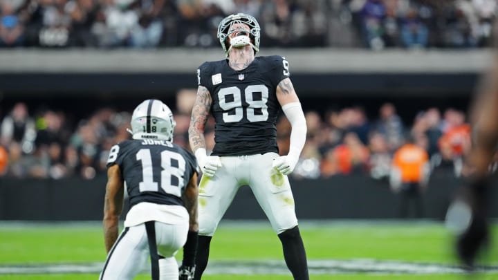 Jan 7, 2024; Paradise, Nevada, USA; Las Vegas Raiders defensive end Maxx Crosby (98) celebrates after sacking Denver Broncos quarterback Jarrett Stidham (4) during the second quarter at Allegiant Stadium. Mandatory Credit: Stephen R. Sylvanie-USA TODAY Sports