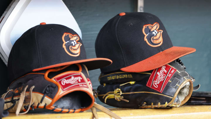 Apr 27, 2023; Detroit, Michigan, USA;  Baltimore Orioles hats and glove sits in dugout in the second inning against the Detroit Tigers at Comerica Park.