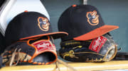 Apr 27, 2023; Detroit, Michigan, USA;  Baltimore Orioles hats and glove sits in dugout in the second inning against the Detroit Tigers at Comerica Park.