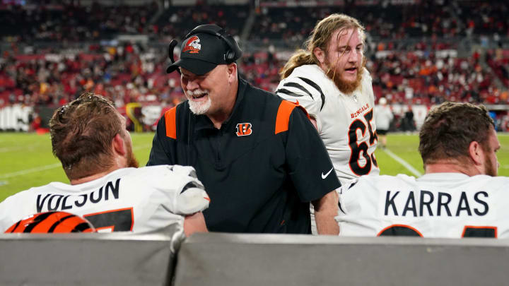 Cincinnati Bengals offensive line coach Frank Pollack shares a laugh with Cincinnati Bengals offensive tackle Cordell Volson (67) in the fourth quarter during a Week 15 NFL game against the Tampa Bay Buccaneers, Sunday, Dec. 18, 2022, at Raymond James Stadium in Tampa, Fla. The Cincinnati Bengals won, 34-23. The Cincinnati Bengals improved to 10-4 on the season.

Nfl Cincinnati Bengals At Tampa Bay Buccaneers Dec 18 0389