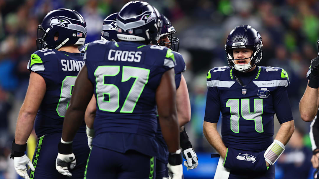 Seattle Seahawks quarterback Sam Darnold in the huddle against the San Francisco 49ers.