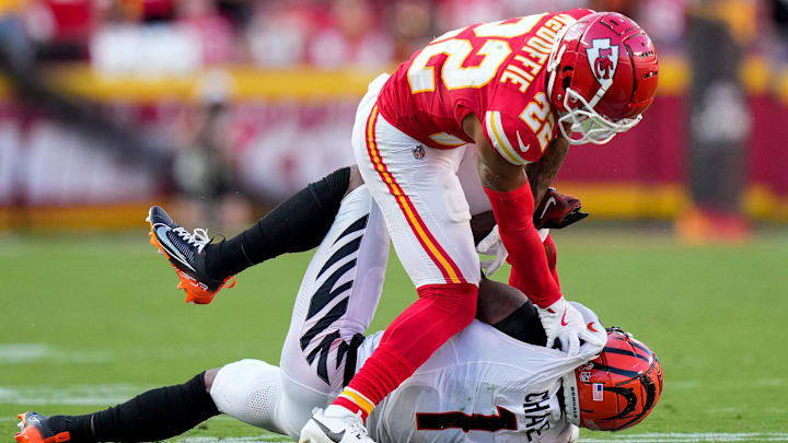 Kansas City Chiefs cornerback Trent McDuffie (22) brings down Cincinnati Bengals wide receiver Ja'Marr Chase (1) in the fourth quarter of the NFL Week 2 game between the Kansas City Chiefs and the Cincinnati Bengals at Arrowhead Stadium in Kansas City on Sunday, Sept. 15, 2024. The Chiefs took a 26-25 win with a go-ahead field goal as time expired.