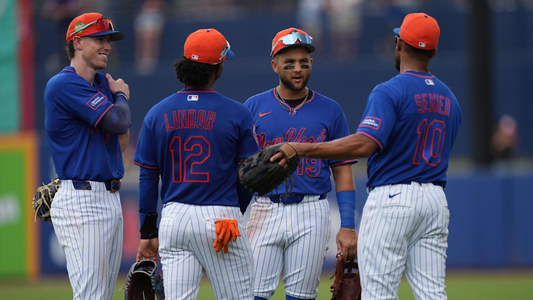 Mar 15, 2026; Port St. Lucie, Florida, USA;  (l to rt) New York Mets third baseman Brett Baty (7), shortstop Francisco Lindor (12), shortstop Bo Bichette (19) and second baseman Marcus Semien (10) gather during a pitching change in the fourth inning against the Toronto Blue Jays at Clover Park. Mandatory Credit: Jim Rassol-Imagn Images