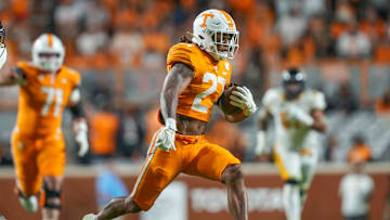 Tennessee running back Peyton Lewis (27) runs with the ball during a NCAA game between Tennessee and Kent State in Neyland Stadium in Knoxville on Saturday, Sept. 14, 2024.