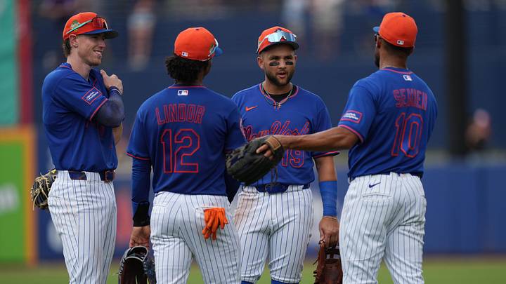 Mar 15, 2026; Port St. Lucie, Florida, USA;  (l to rt) New York Mets third baseman Brett Baty (7), shortstop Francisco Lindor (12), shortstop Bo Bichette (19) and second baseman Marcus Semien (10) gather during a pitching change in the fourth inning against the Toronto Blue Jays at Clover Park. Mandatory Credit: Jim Rassol-Imagn Images