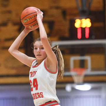 Wagner's Ashlyn Koupal looks for a teammate to pass the ball on Saturday, January 15, 2022, in the Girls Hanson Classic at the Corn Palace in Mitchell.

Wagner Vs West Central 010