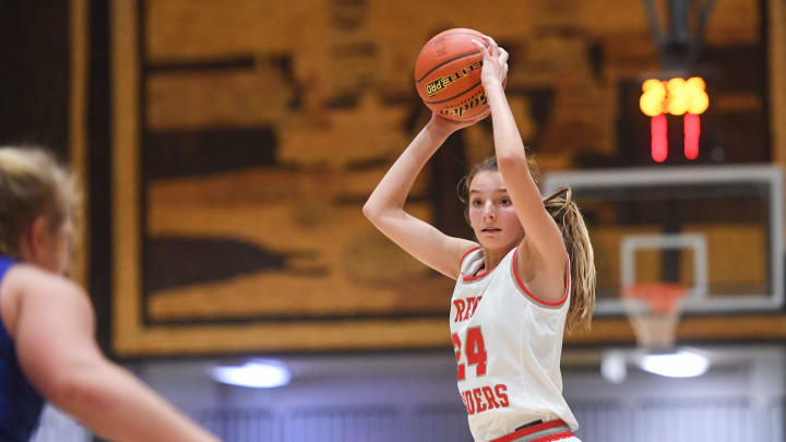 Wagner's Ashlyn Koupal looks for a teammate to pass the ball on Saturday, January 15, 2022, in the Girls Hanson Classic at the Corn Palace in Mitchell.

Wagner Vs West Central 010