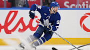 Sep 26, 2024; Toronto, Ontario, CAN;  Toronto Maple Leafs defenseman Oliver Ekman-Larsson (95) turns with the puck against the Montreal Canadiens in the second period at Scotiabank Arena. Mandatory Credit: Dan Hamilton-Imagn Images