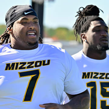 Oct 12, 2024; Amherst, Massachusetts, USA; Missouri Tigers defensive tackle Chris McClellan (7) warms up before a game against the Massachusetts Minutemen at Warren McGuirk Alumni Stadium. Mandatory Credit: Eric Canha-Imagn Images