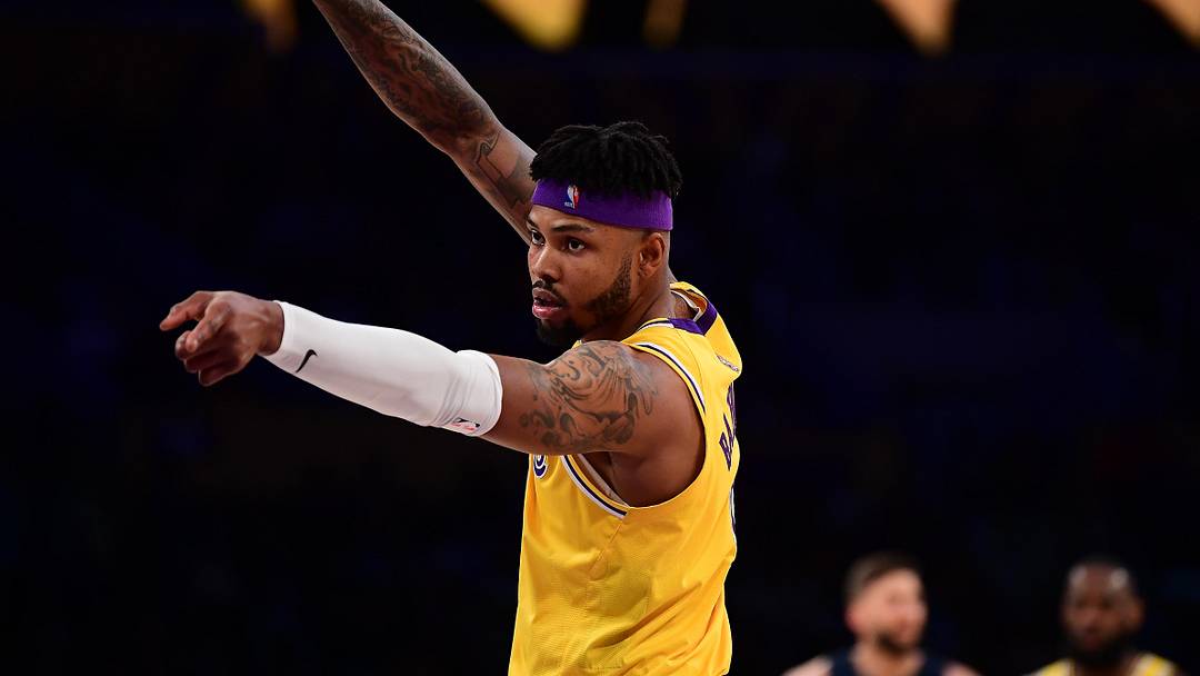 Mar 1, 2022; Los Angeles, California, USA; Los Angeles Lakers forward Kent Bazemore (9) reacts against the Dallas Mavericks during the second half at Crypto.com Arena. Mandatory Credit: Gary A. Vasquez-Imagn Images