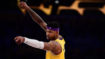 Mar 1, 2022; Los Angeles, California, USA; Los Angeles Lakers forward Kent Bazemore (9) reacts against the Dallas Mavericks during the second half at Crypto.com Arena. Mandatory Credit: Gary A. Vasquez-Imagn Images