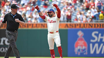 Jul 6, 2025; Philadelphia, Pennsylvania, USA; Philadelphia Phillies outfielder Kyle Schwarber (12) stands on second base after hitting an RBI double during the fifth inning against the Cincinnati Reds at Citizens Bank Park. Mandatory Credit: Eric Hartline-Imagn Images