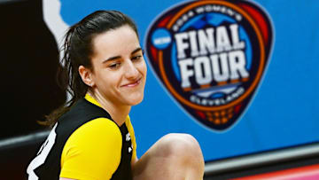 Apr 4, 2024; Cleveland, OH, USA; Iowa Hawkeyes guard Caitlin Clark (22) stretches during a practice