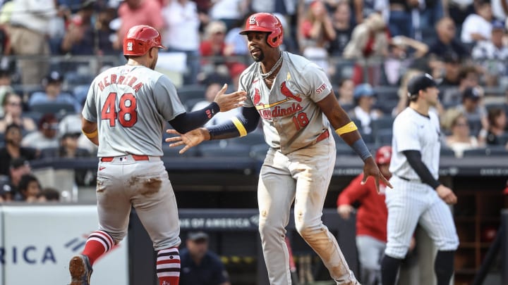 Sep 1, 2024; Bronx, New York, USA;  St. Louis Cardinals right fielder Jordan Walker (18) celebrates with catcher Iván Herrera (48) after scoring in the seventh inning against the New York Yankees at Yankee Stadium. Mandatory Credit: Wendell Cruz-USA TODAY Sports