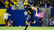 Jan 8, 2024; Houston, TX, USA; Michigan Wolverines tight end Colston Loveland (18) against the Washington Huskies during the 2024 College Football Playoff national championship game at NRG Stadium. Mandatory Credit: Mark J. Rebilas-Imagn Images