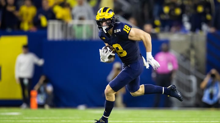 Jan 8, 2024; Houston, TX, USA; Michigan Wolverines tight end Colston Loveland (18) against the Washington Huskies during the 2024 College Football Playoff national championship game at NRG Stadium. Mandatory Credit: Mark J. Rebilas-Imagn Images