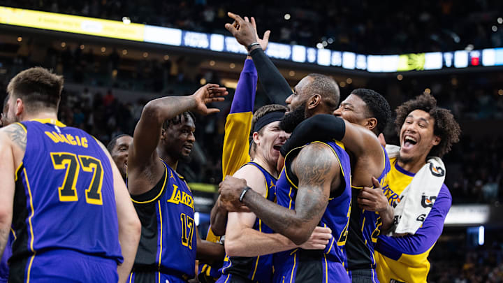 Los Angeles Lakers forward LeBron James celebrates his game winning shot against the Indiana Pacers.