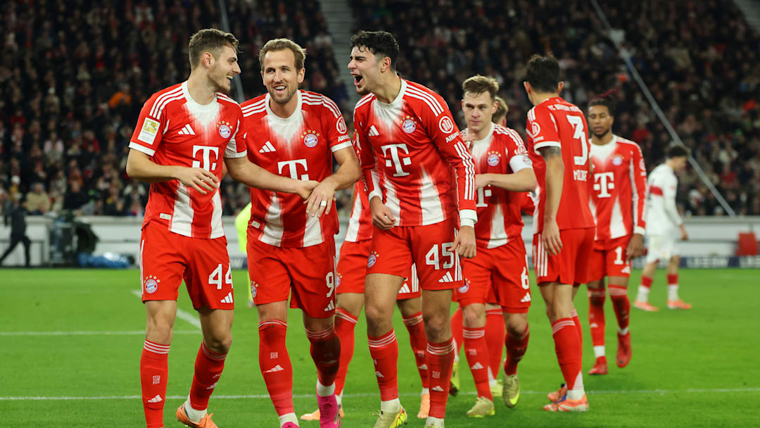 Bayern Munich players celebrating against VfB Stuttgart. Bayern Munich players celebrating against VfB Stuttgart.
