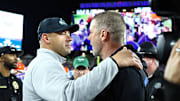 Tulane Green Wave head coach Jon Sumrall and Florida Gators head coach Billy Napier greet after the game at Raymond James Stadium. 