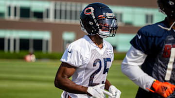 Jul 29, 2021; Lake Forest, IL, USA; Chicago Bears defensive back Artie Burns (25) runs a lap around the field at the start of a Chicago Bears training camp session at Halas Hall. Mandatory Credit: Jon Durr-Imagn Images