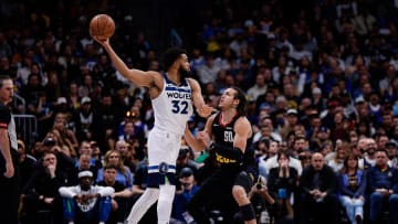 May 6, 2024; Denver, Colorado, USA; Minnesota Timberwolves center Karl-Anthony Towns (32) controls