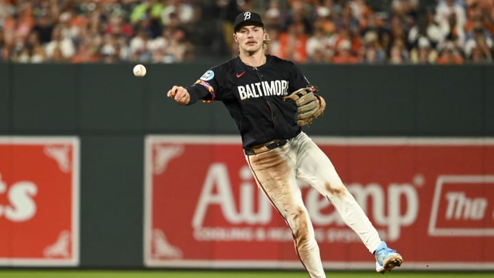 Jun 29, 2024; Baltimore, Maryland, USA;  Baltimore Orioles shortstop Gunnar Henderson (2) throws to first base during the seventh inning against the Texas Rangers at Oriole Park at Camden Yards. Mandatory Credit: Tommy Gilligan-USA TODAY Sports