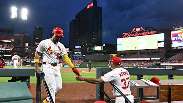 St. Louis Cardinals designated hitter Ivan Herrera (48) celebrates with manager Oliver Marmol