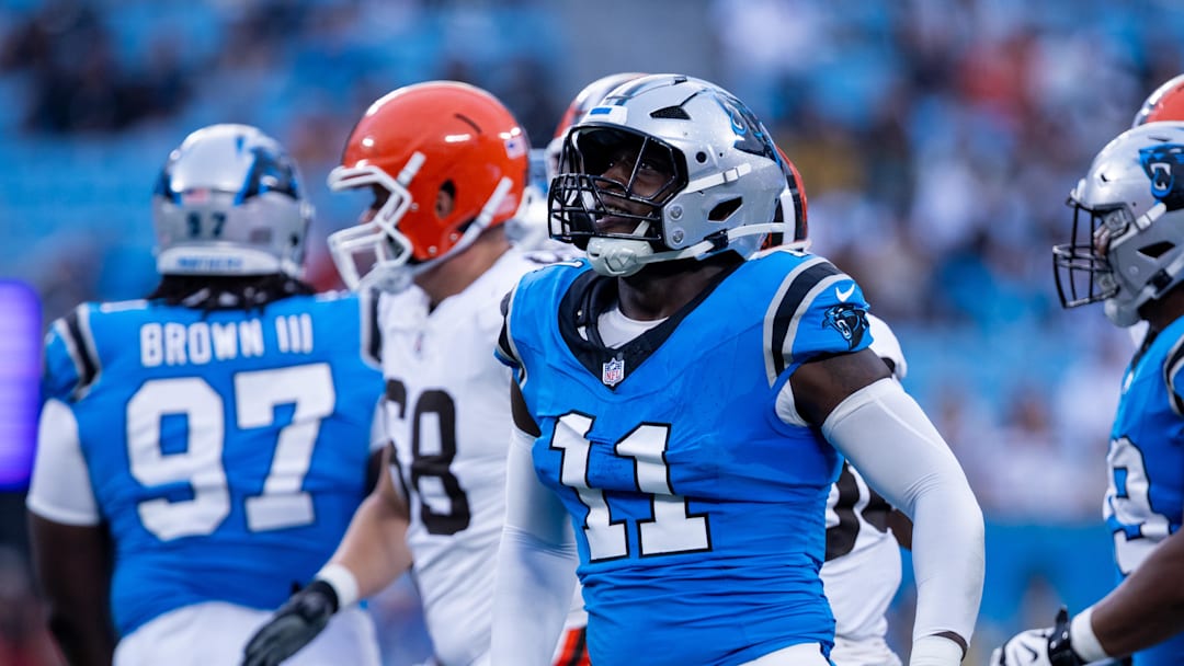 Aug 8, 2025; Charlotte, North Carolina, USA; Carolina Panthers linebacker Nic Scourton (11) celebrates during the second quarter against the Cleveland Browns at Bank of America Stadium. Mandatory Credit: Scott Kinser-The USAToday Network via Imagn Images 