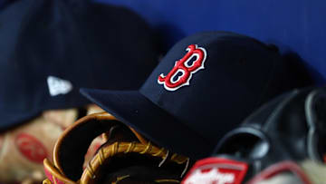Sep 20, 2019; St. Petersburg, FL, USA; A detail view of Boston Red Sox hats and gloves at Tropicana Field. Mandatory Credit: Kim Klement-Imagn Images