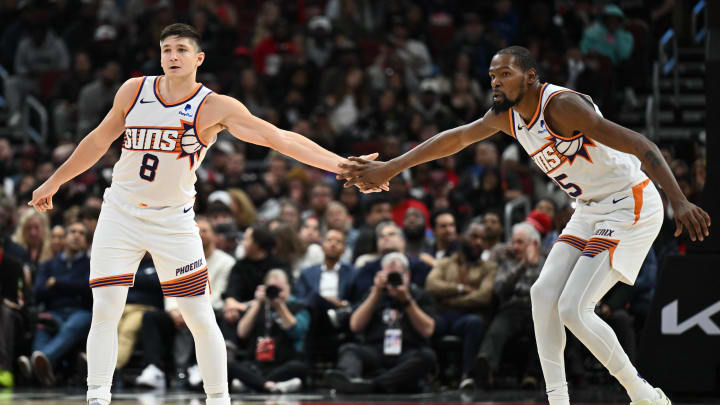 Nov 8, 2023; Chicago, Illinois, USA; Phoenix Suns forward Kevin Durant (35), right, congratulates guard Grayson Allen (8) after Allen hit a three-point shot in the second half against the Chicago Bulls at United Center. Mandatory Credit: Jamie Sabau-USA TODAY Sports