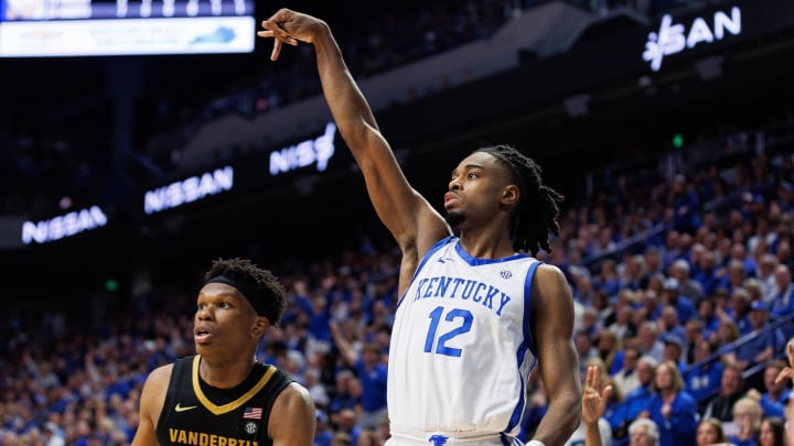 Mar 6, 2024; Lexington, Kentucky, USA; Kentucky Wildcats guard Antonio Reeves (12) watches his shot during the second half against the Vanderbilt Commodores at Rupp Arena at Central Bank Center. Mandatory Credit: Jordan Prather-USA TODAY Sports