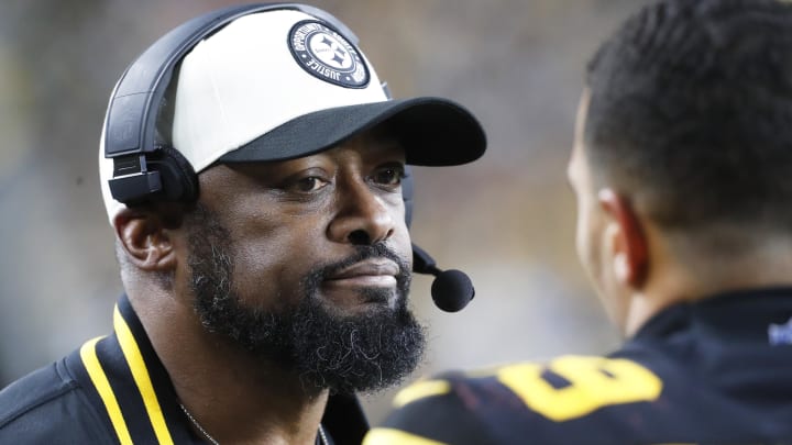 Dec 7, 2023; Pittsburgh, Pennsylvania, USA;  Pittsburgh Steelers head coach Mike Tomlin (left) reacts to safety Minkah Fitzpatrick (39) on the sidelines against the New England Patriots during the fourth quarter at Acrisure Stadium. Mandatory Credit: Charles LeClaire-USA TODAY Sports