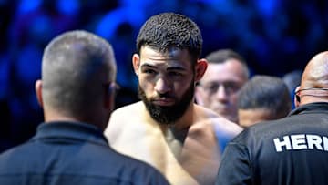 Nassourdine Imavov gets checked out by the officials before the start of his middleweight main bout against Jared Cannonier at the UFC Fight Night mixed martial arts event Saturday, June 8, 2024, in Louisville, Ky.