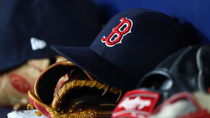 Sep 20, 2019; St. Petersburg, FL, USA; A detail view of Boston Red Sox hats and gloves at Tropicana Field. Mandatory Credit: Kim Klement-USA TODAY Sports