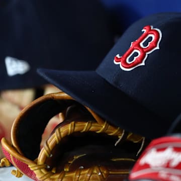 Sep 20, 2019; St. Petersburg, FL, USA; A detail view of Boston Red Sox hats and gloves at Tropicana Field. Mandatory Credit: Kim Klement-Imagn Images