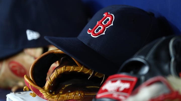 Sep 20, 2019; St. Petersburg, FL, USA; A detail view of Boston Red Sox hats and gloves at Tropicana Field. Mandatory Credit: Kim Klement-USA TODAY Sports