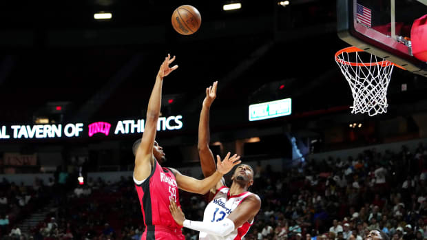  Houston Rockets center Orlando Robinson (59) shoots against Washington Wizards