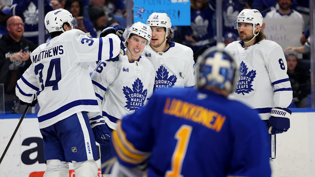 Apr 15, 2025; Buffalo, New York, USA;  Toronto Maple Leafs right wing Mitch Marner (16) celebrates his goal with teammates during the third period against the Buffalo Sabres at KeyBank Center. Mandatory Credit: Timothy T. Ludwig-Imagn Images