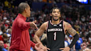 Mar 12, 2025; Nashville, TN, USA;  South Carolina Gamecocks head coach Lamont Paris talks with guard Jacobi Wright (1) during a break in action during the second half at Bridgestone Arena. Mandatory Credit: Steve Roberts-Imagn Images