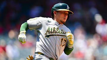 Jun 11, 2025; Anaheim, California, USA; Athletics second baseman Luis Urias (17) runs after hitting a triple against the Los Angeles Angels during the fourth inning at Angel Stadium.