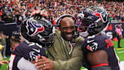 Nov 9, 2025; Houston, Texas, USA; Houston Texans head coach DeMeco Ryans with defensive tackle Sheldon Rankins (90) and linebacker Azeez Al-Shaair (0) following a game against the Jacksonville Jaguars at NRG Stadium. Mandatory Credit: Thomas Shea-Imagn Images