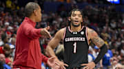 Mar 12, 2025; Nashville, TN, USA;  South Carolina Gamecocks head coach Lamont Paris talks with guard Jacobi Wright (1) during a break in action during the second half at Bridgestone Arena. Mandatory Credit: Steve Roberts-Imagn Images