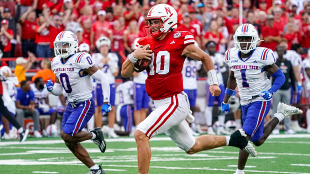 Nebraska Cornhuskers quarterback Heinrich Haarberg (10) runs for a touchdown against the Louisiana Tech Bulldogs